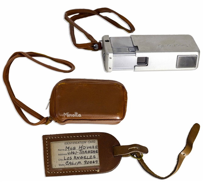 Moe Howard's Handwritten Luggage Tag & His Minolta-16 Miniature Camera, in Brown Leather Case -- Leather Tag Measures 3.75'' x 2'', Cased Camera Measures 4'' x 2'' -- Very Good